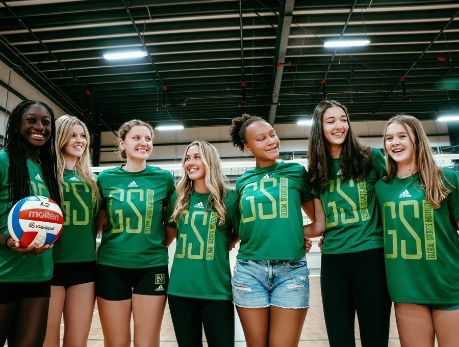 GSI club volleyball athletes together inside the training facility