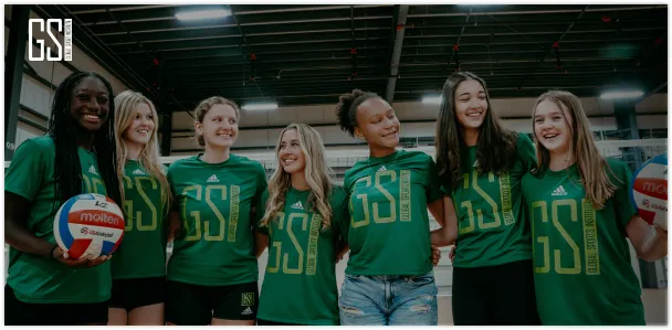 GSI volleyball athletes together in the gym