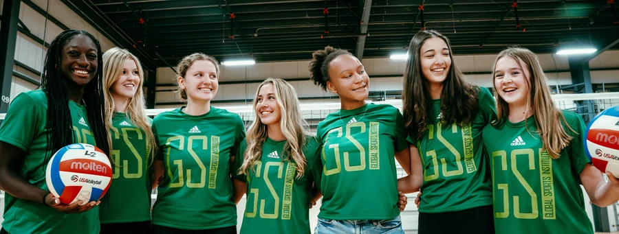 GSI club volleyball athletes together inside the training facility