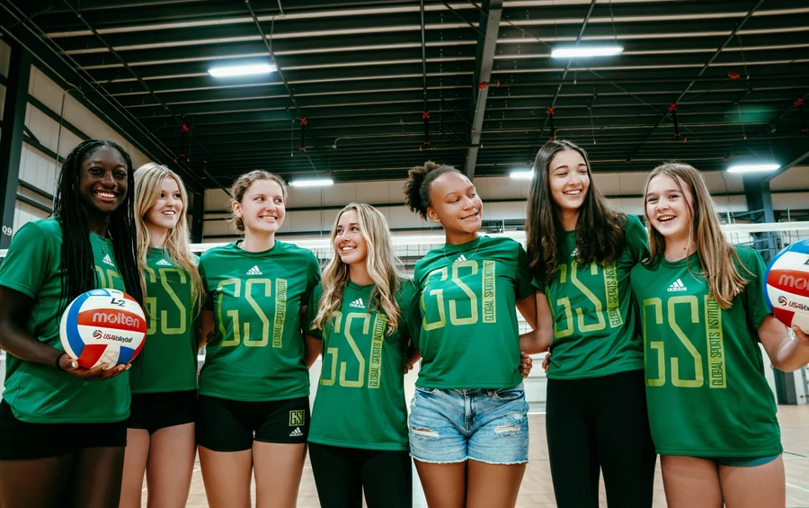 GSI club volleyball athletes together inside the training facility